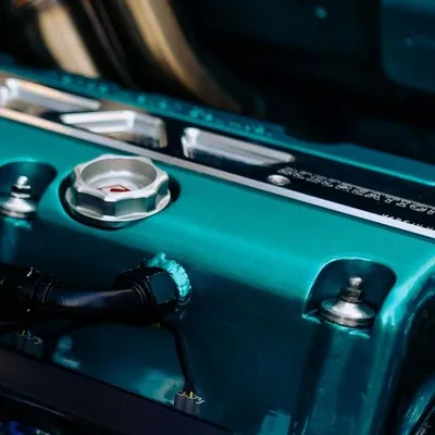 Detailed view of a vehicle engine and metal components